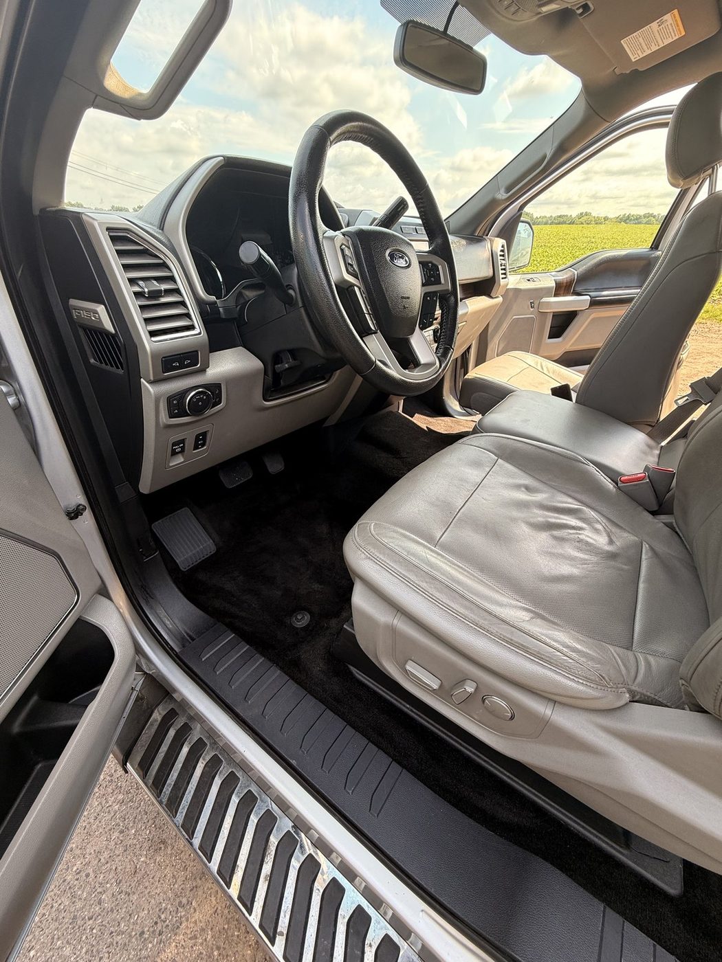 Same Ford F-150 interior after full detail, seat and floor clean